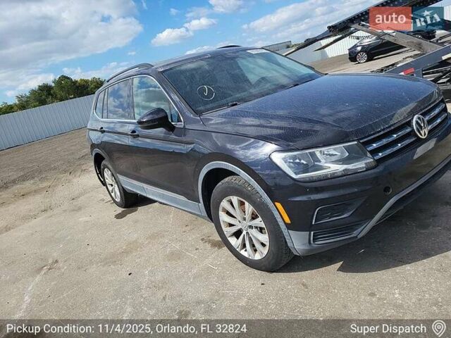 Черный Фольксваген Тигуан, объемом двигателя 2 л и пробегом 175 тыс. км за 7300 $, фото 2 на Automoto.ua