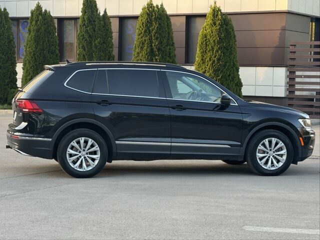 Чорний Фольксваген Тігуан, об'ємом двигуна 2 л та пробігом 123 тис. км за 18400 $, фото 7 на Automoto.ua