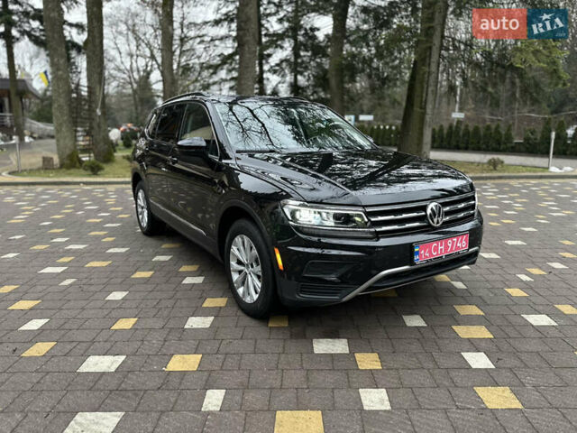 Чорний Фольксваген Тігуан, об'ємом двигуна 2 л та пробігом 186 тис. км за 17300 $, фото 4 на Automoto.ua