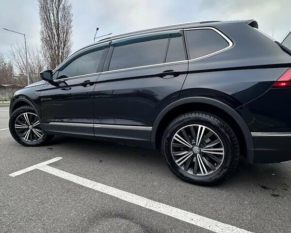 Черный Фольксваген Тигуан, объемом двигателя 1.98 л и пробегом 80 тыс. км за 25000 $, фото 27 на Automoto.ua