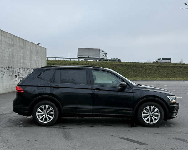 Черный Фольксваген Тигуан, объемом двигателя 1.98 л и пробегом 112 тыс. км за 14300 $, фото 4 на Automoto.ua