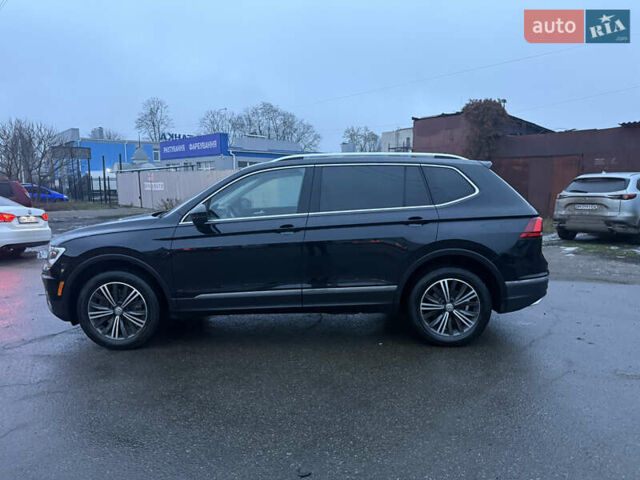Чорний Фольксваген Тігуан, об'ємом двигуна 2 л та пробігом 162 тис. км за 18750 $, фото 5 на Automoto.ua