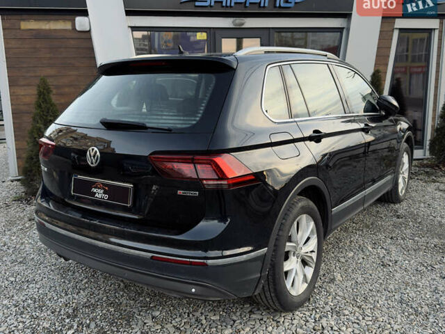Чорний Фольксваген Тігуан, об'ємом двигуна 1.97 л та пробігом 243 тис. км за 23200 $, фото 5 на Automoto.ua
