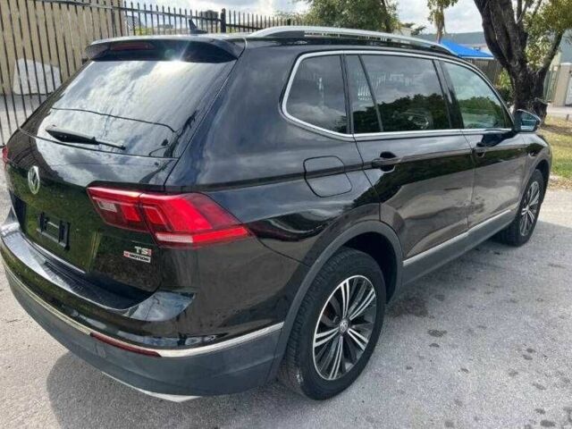 Чорний Фольксваген Тігуан, об'ємом двигуна 2 л та пробігом 34 тис. км за 4600 $, фото 3 на Automoto.ua