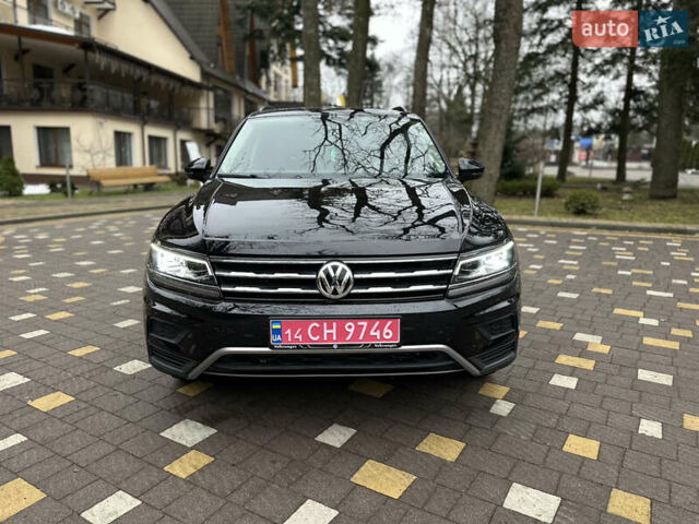 Чорний Фольксваген Тігуан, об'ємом двигуна 2 л та пробігом 186 тис. км за 17300 $, фото 2 на Automoto.ua