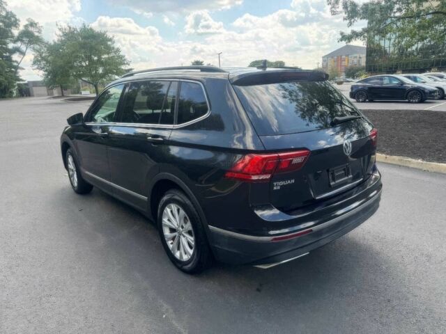 Черный Фольксваген Тигуан, объемом двигателя 2 л и пробегом 37 тыс. км за 13000 $, фото 4 на Automoto.ua