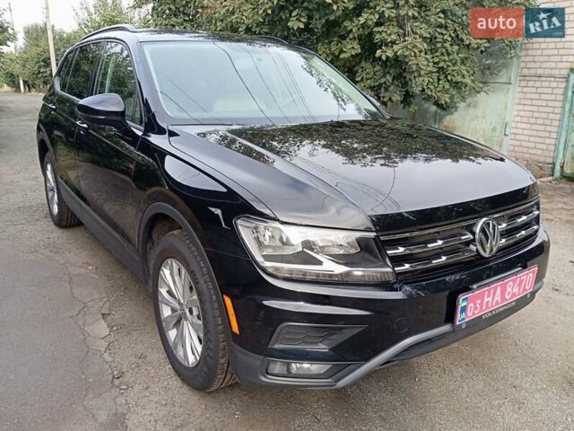 Черный Фольксваген Тигуан, объемом двигателя 2 л и пробегом 149 тыс. км за 16800 $, фото 27 на Automoto.ua