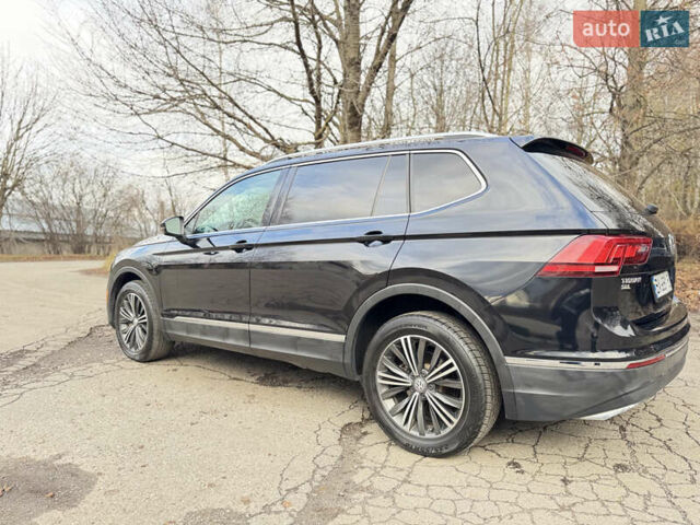 Черный Фольксваген Тигуан, объемом двигателя 2 л и пробегом 183 тыс. км за 19700 $, фото 2 на Automoto.ua