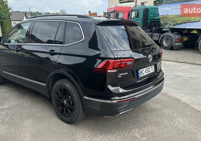 Чорний Фольксваген Тігуан, об'ємом двигуна 1.98 л та пробігом 62 тис. км за 17950 $, фото 9 на Automoto.ua