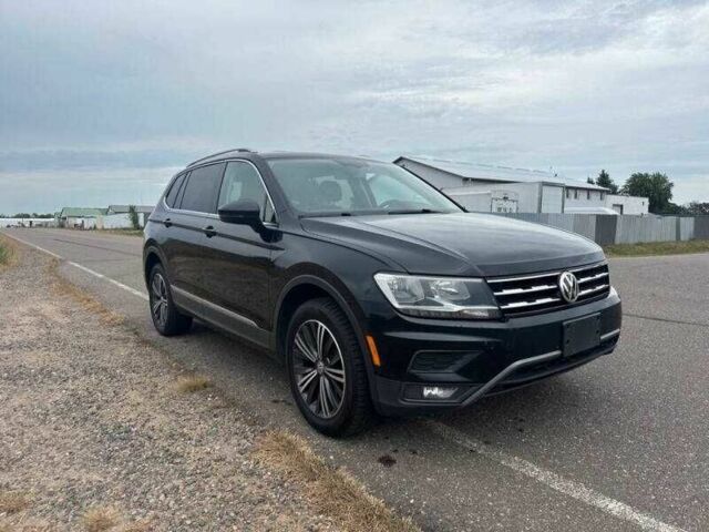 Чорний Фольксваген Тігуан, об'ємом двигуна 2 л та пробігом 71 тис. км за 7000 $, фото 6 на Automoto.ua