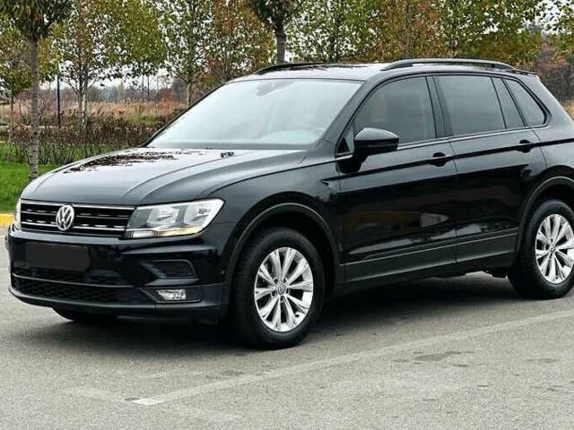 Чорний Фольксваген Тігуан, об'ємом двигуна 2 л та пробігом 150 тис. км за 23000 $, фото 2 на Automoto.ua