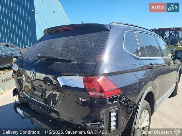 Черный Фольксваген Тигуан, объемом двигателя 2 л и пробегом 175 тыс. км за 7300 $, фото 7 на Automoto.ua