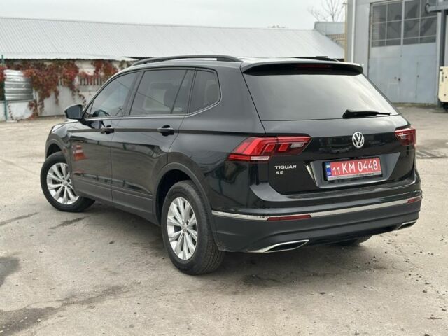 Чорний Фольксваген Тігуан, об'ємом двигуна 2 л та пробігом 139 тис. км за 16900 $, фото 2 на Automoto.ua