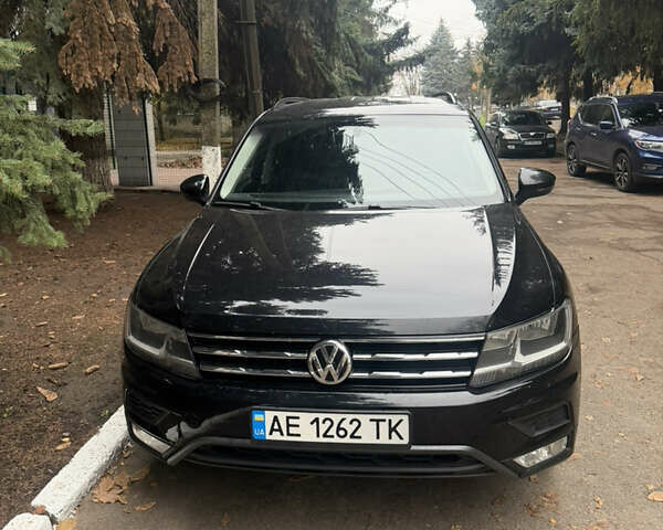 Черный Фольксваген Тигуан, объемом двигателя 1.98 л и пробегом 195 тыс. км за 16000 $, фото 2 на Automoto.ua