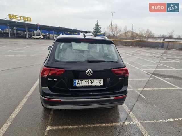 Черный Фольксваген Тигуан, объемом двигателя 1.98 л и пробегом 243 тыс. км за 23310 $, фото 2 на Automoto.ua