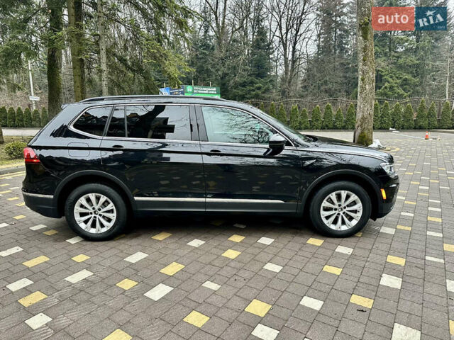 Чорний Фольксваген Тігуан, об'ємом двигуна 2 л та пробігом 186 тис. км за 17300 $, фото 21 на Automoto.ua