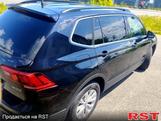 Черный Фольксваген Тигуан, объемом двигателя 2 л и пробегом 165 тыс. км за 16500 $, фото 5 на Automoto.ua