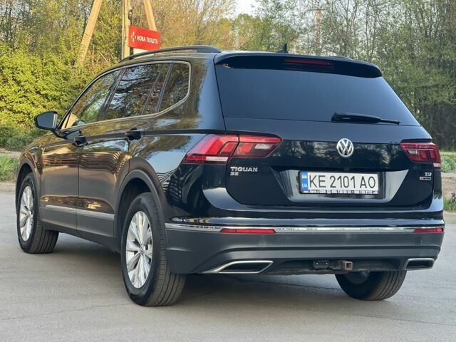 Чорний Фольксваген Тігуан, об'ємом двигуна 2 л та пробігом 123 тис. км за 18400 $, фото 6 на Automoto.ua