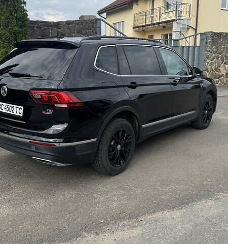 Чорний Фольксваген Тігуан, об'ємом двигуна 1.98 л та пробігом 62 тис. км за 17950 $, фото 12 на Automoto.ua