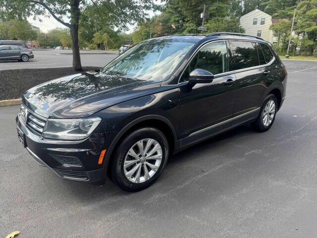 Чорний Фольксваген Тігуан, об'ємом двигуна 2 л та пробігом 45 тис. км за 13200 $, фото 1 на Automoto.ua