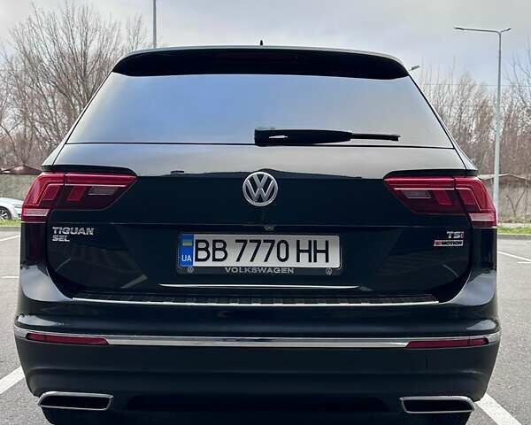 Черный Фольксваген Тигуан, объемом двигателя 1.98 л и пробегом 80 тыс. км за 25000 $, фото 1 на Automoto.ua