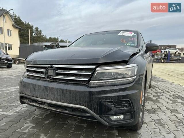 Черный Фольксваген Тигуан, объемом двигателя 2 л и пробегом 94 тыс. км за 17260 $, фото 1 на Automoto.ua