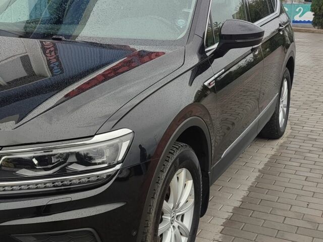 Чорний Фольксваген Тігуан, об'ємом двигуна 2 л та пробігом 260 тис. км за 24950 $, фото 2 на Automoto.ua