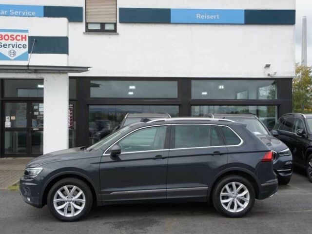 Черный Фольксваген Тигуан, объемом двигателя 2 л и пробегом 91 тыс. км за 14500 $, фото 1 на Automoto.ua