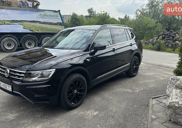 Чорний Фольксваген Тігуан, об'ємом двигуна 1.98 л та пробігом 62 тис. км за 17950 $, фото 4 на Automoto.ua