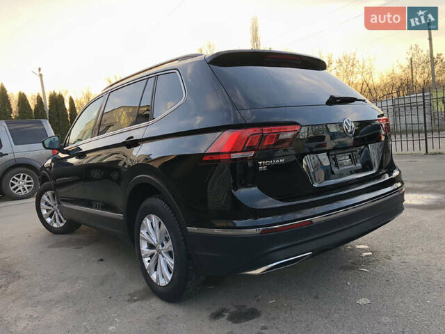 Черный Фольксваген Тигуан, объемом двигателя 2 л и пробегом 188 тыс. км за 12890 $, фото 3 на Automoto.ua