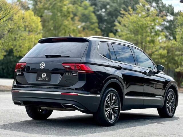 Чорний Фольксваген Тігуан, об'ємом двигуна 2 л та пробігом 37 тис. км за 4000 $, фото 6 на Automoto.ua