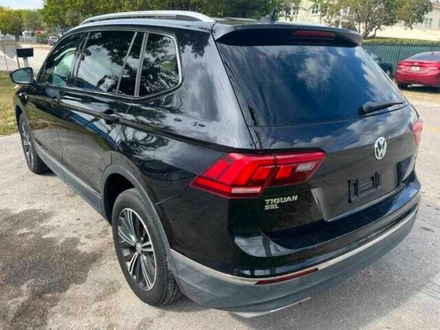 Чорний Фольксваген Тігуан, об'ємом двигуна 2 л та пробігом 34 тис. км за 4600 $, фото 1 на Automoto.ua