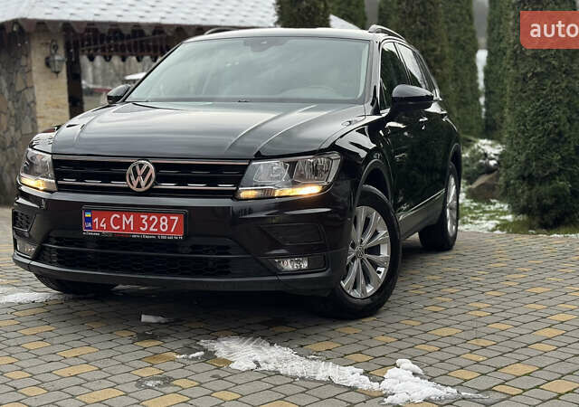 Чорний Фольксваген Тігуан, об'ємом двигуна 1.98 л та пробігом 258 тис. км за 23300 $, фото 1 на Automoto.ua