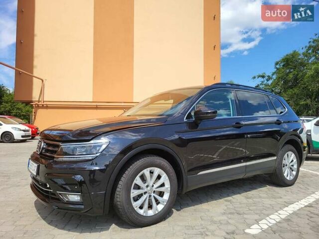 Чорний Фольксваген Тігуан, об'ємом двигуна 2 л та пробігом 101 тис. км за 21000 $, фото 2 на Automoto.ua