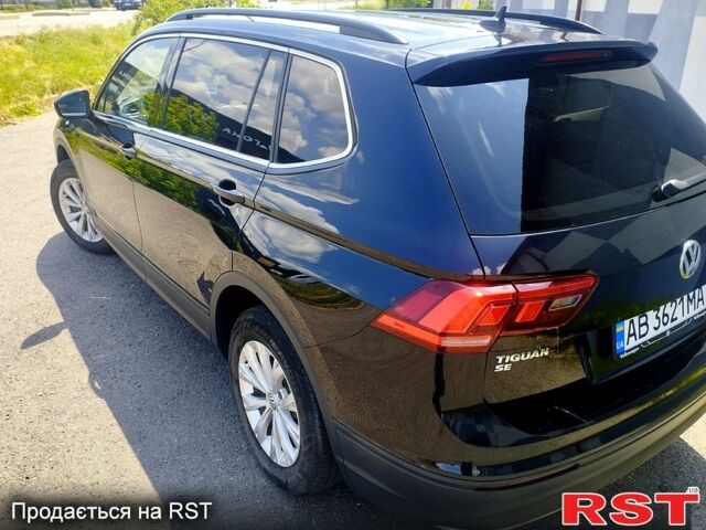 Черный Фольксваген Тигуан, объемом двигателя 2 л и пробегом 165 тыс. км за 16500 $, фото 2 на Automoto.ua