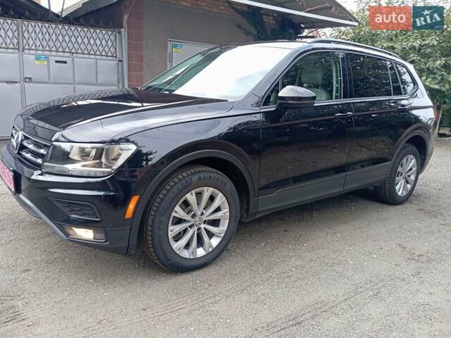 Черный Фольксваген Тигуан, объемом двигателя 2 л и пробегом 149 тыс. км за 16800 $, фото 1 на Automoto.ua