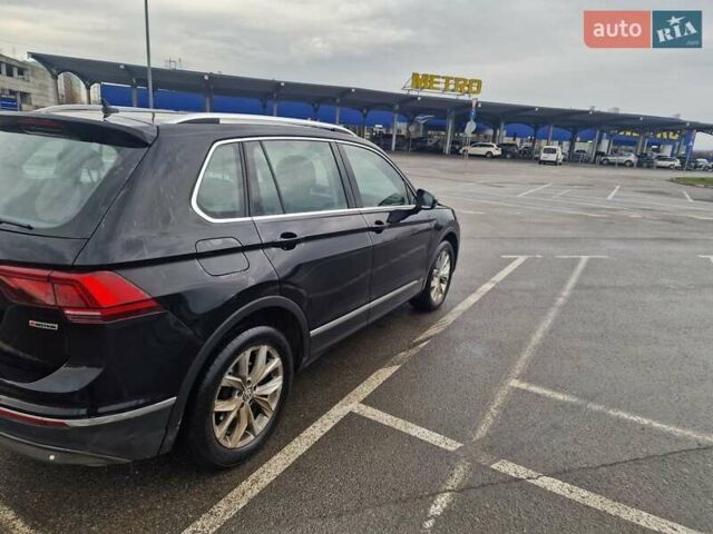Черный Фольксваген Тигуан, объемом двигателя 1.98 л и пробегом 243 тыс. км за 23310 $, фото 3 на Automoto.ua