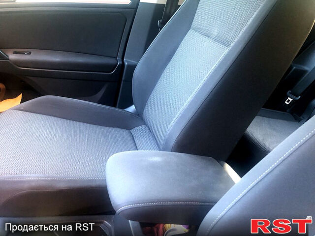 Черный Фольксваген Тигуан, объемом двигателя 2 л и пробегом 258 тыс. км за 21000 $, фото 1 на Automoto.ua