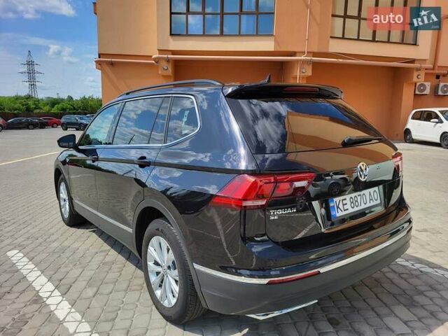Чорний Фольксваген Тігуан, об'ємом двигуна 2 л та пробігом 101 тис. км за 21000 $, фото 10 на Automoto.ua