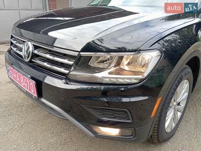 Черный Фольксваген Тигуан, объемом двигателя 2 л и пробегом 149 тыс. км за 16800 $, фото 2 на Automoto.ua