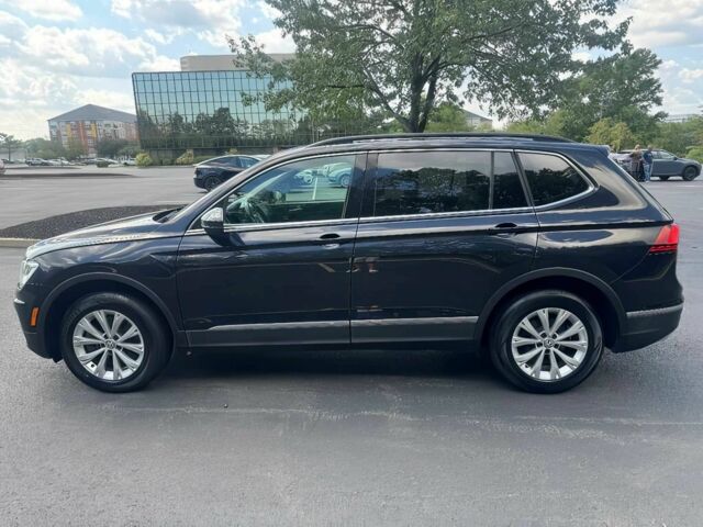 Чорний Фольксваген Тігуан, об'ємом двигуна 2 л та пробігом 45 тис. км за 13200 $, фото 2 на Automoto.ua