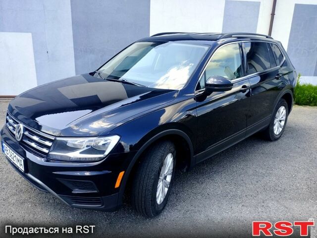 Черный Фольксваген Тигуан, объемом двигателя 2 л и пробегом 165 тыс. км за 16500 $, фото 1 на Automoto.ua