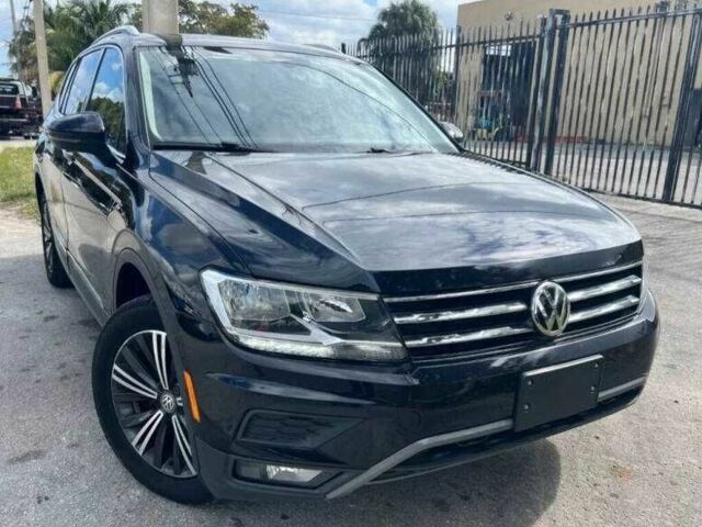 Чорний Фольксваген Тігуан, об'ємом двигуна 2 л та пробігом 34 тис. км за 4600 $, фото 4 на Automoto.ua