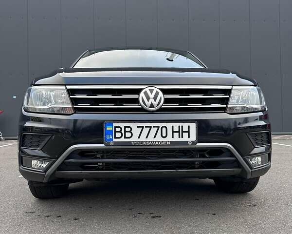 Черный Фольксваген Тигуан, объемом двигателя 1.98 л и пробегом 80 тыс. км за 25000 $, фото 2 на Automoto.ua