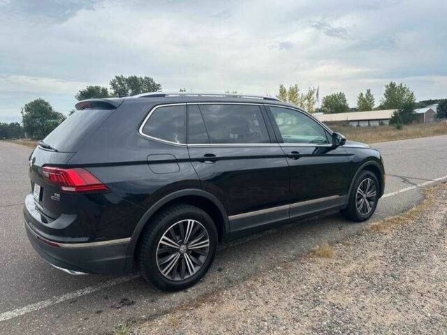 Чорний Фольксваген Тігуан, об'ємом двигуна 2 л та пробігом 71 тис. км за 7000 $, фото 4 на Automoto.ua