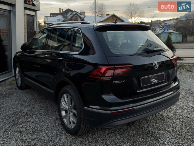 Чорний Фольксваген Тігуан, об'ємом двигуна 1.97 л та пробігом 243 тис. км за 23200 $, фото 4 на Automoto.ua