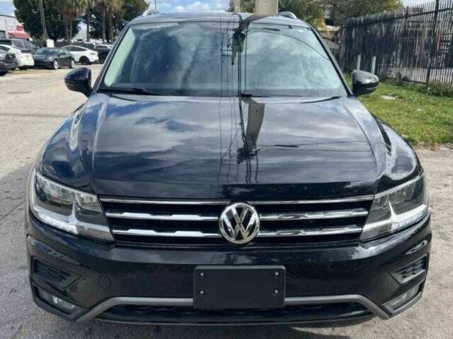 Чорний Фольксваген Тігуан, об'ємом двигуна 2 л та пробігом 34 тис. км за 4600 $, фото 5 на Automoto.ua