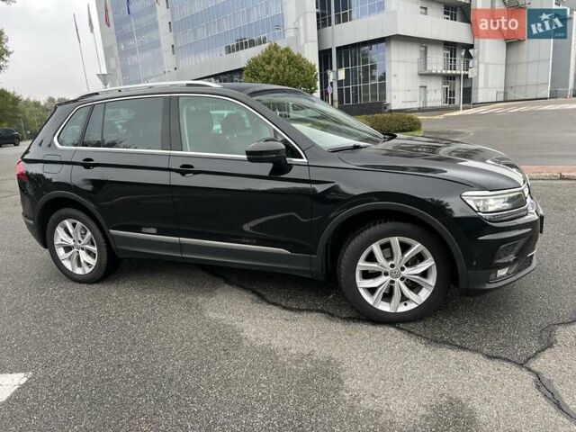 Чорний Фольксваген Тігуан, об'ємом двигуна 1.98 л та пробігом 138 тис. км за 28500 $, фото 5 на Automoto.ua