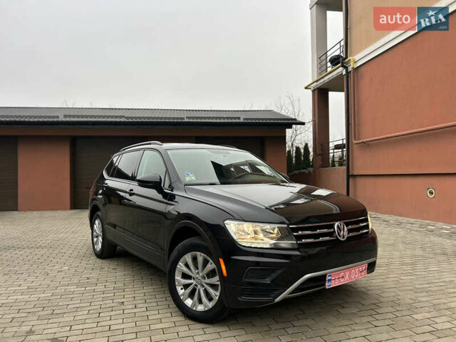 Черный Фольксваген Тигуан, объемом двигателя 2 л и пробегом 105 тыс. км за 16350 $, фото 1 на Automoto.ua