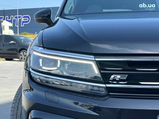 Черный Фольксваген Тигуан, объемом двигателя 2 л и пробегом 161 тыс. км за 25690 $, фото 2 на Automoto.ua